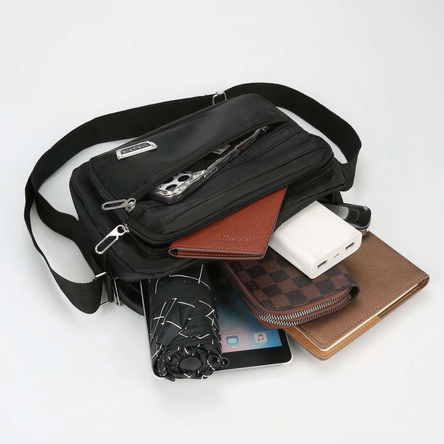 حقيبة كتف رجالية مقاومة للماء  - مراجعة Travel Accessories Tech وسعره